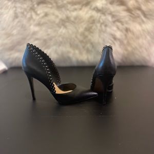 Stud trimmed heel